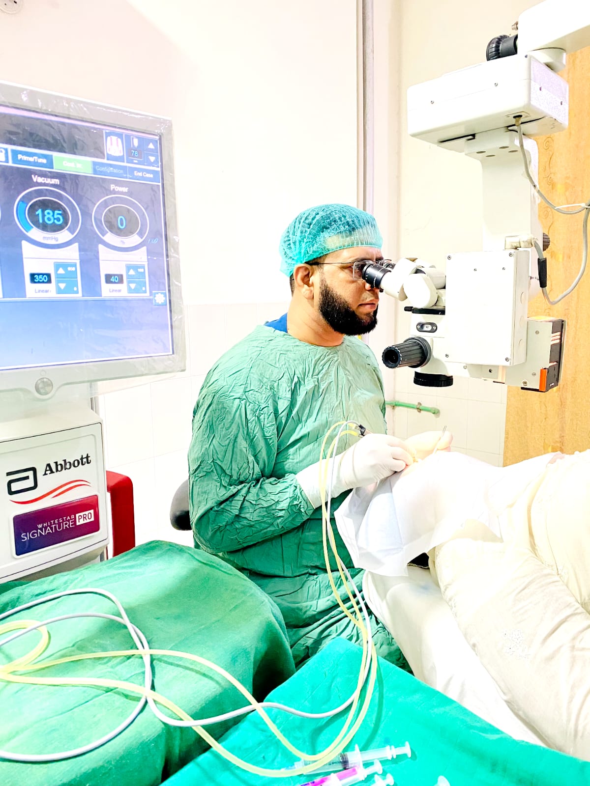 NOVA Eye Centre surgeon performing eye surgery with an operating microscope